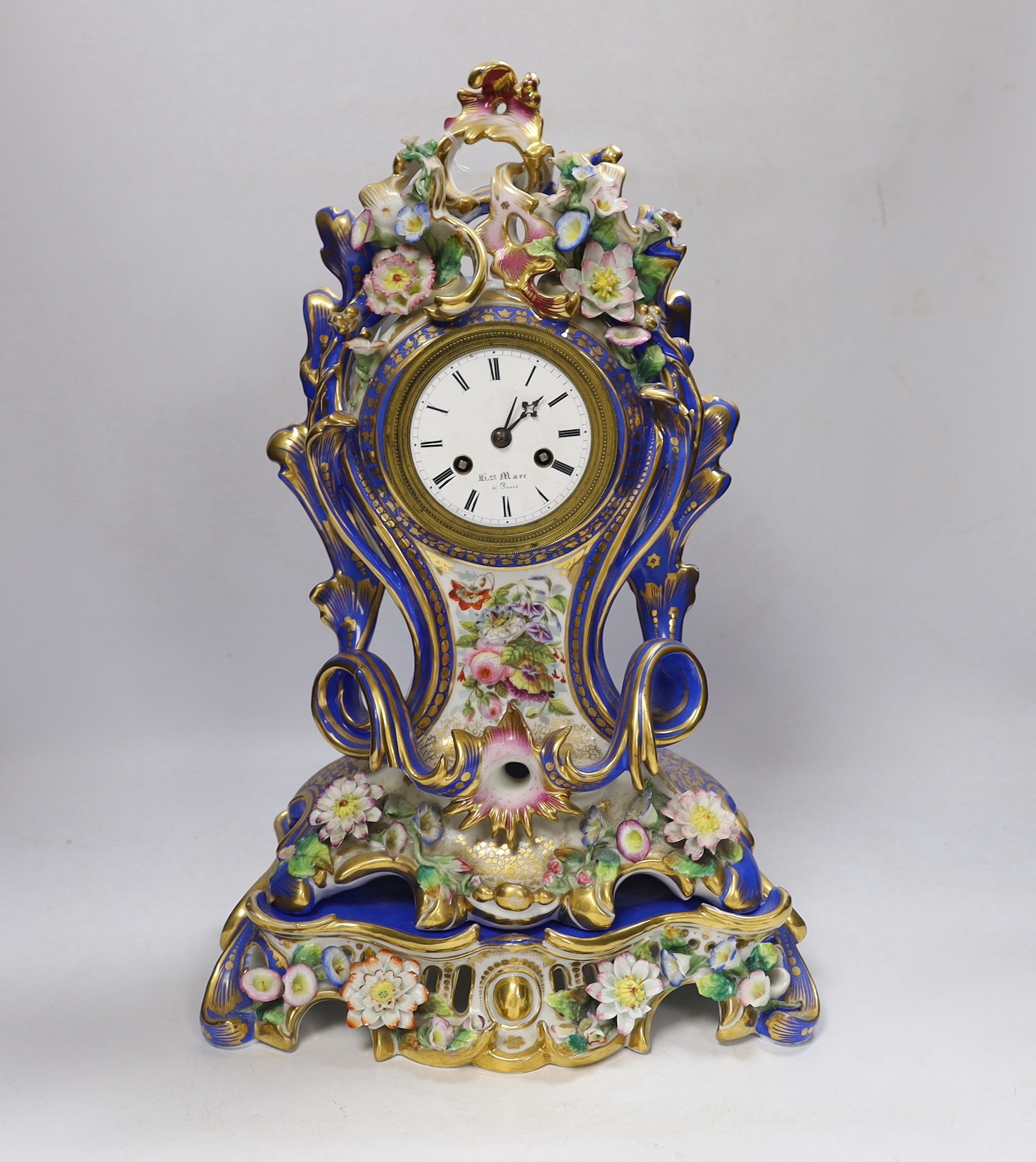 Henri Marc of Paris, a mid 19th century floral encrusted and painted balloon shaped eight day mantel clock, striking on a bell, with key, 42cm